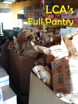 A full pantry at Lemoore Christian Aid thanks to the efforts of local businesses, persons and the U.S. Post Office.